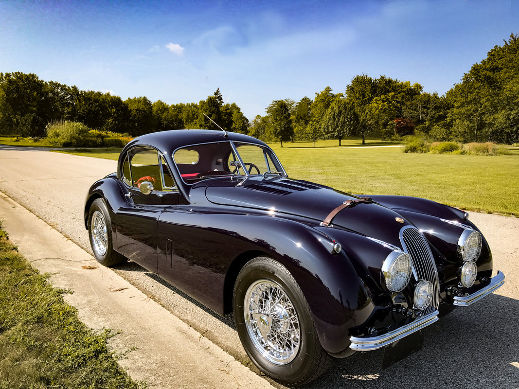 Blue XK120 fixed head coupe